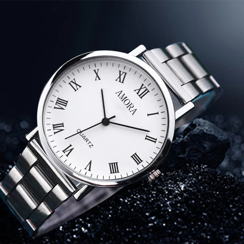 Montre homme élégante et décontractée à quartz, bracelet en acier, argentée, style masculin.