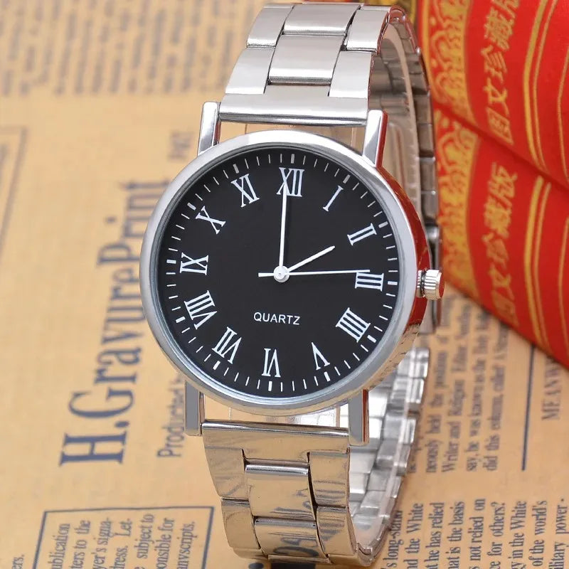 Montre homme élégante et décontractée à quartz, bracelet en acier, argentée, style masculin.