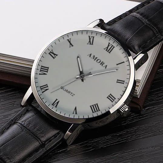Montre homme élégante et décontractée à quartz, bracelet en acier, argentée, style masculin.